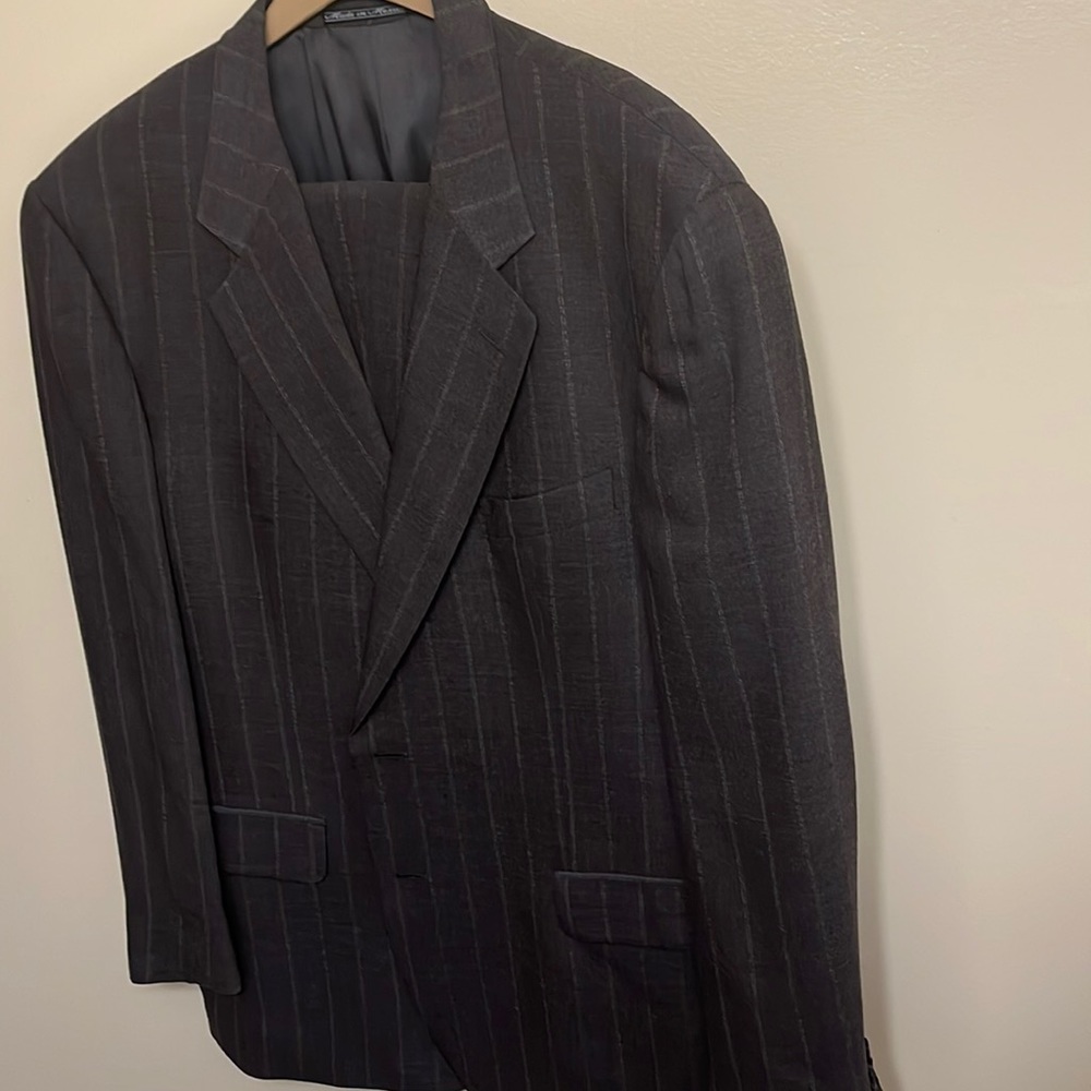 Brown/Gray wool single breasted two button suit. Moderate condition.